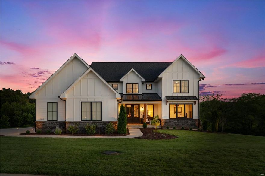 Experience the allure of new custom construction living without the wait! Step into this exquisite, 3-year-old modern home where luxury & functionality seamlessly intertwine. Ideally located on a serene lot in the Pevely Farms neighborhood, this residence boasts an expansive wooded backyard, blending indoor elegance with outdoor tranquility. This stunning home features an open-concept design with vaulted ceilings, creating a welcoming and modern space. The dream kitchen boasts premium quartz countertops, Sub-Zero fridge, and floor-to-ceiling cabinetry surrounding a spectacular range hood. A highlight is the custom-built bunk room, perfect for guests or kids, and a bespoke wine cellar. Luxury pantry, primary closet, and motorized window shades are additional upgrades throughout the home. No stone was unturned in the design of this home. A rare find offering custom upgrades, thoughtful design, and high-end finishes. Schedule your private tour today and live the epitome of modern luxury! Additional Rooms: Mud Room, Wine Cellar