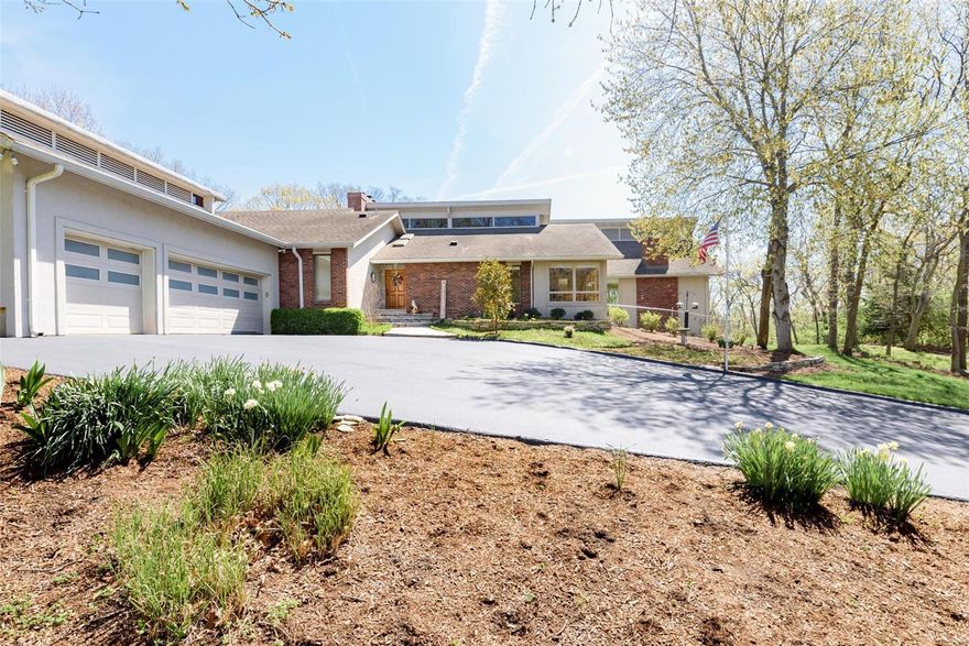 Exceptional park-like 3+ acres in PRIVATE setting adjacent to Powder Valley and on a cul-de-sac in Kirkwood is this sprawling retreat like home! Vaulted tongue and groove redwood ceilings in dining room and primary suite. Oversized primary suite with jetted tub, sitting area, and large walk-in custom closet. Gourmet kitchen with Wolf gas stove, 3 ovens, grill, griddle, large island with granite countertops and a second dishwasher in the butler's pantry is every cook's dream. Hickory hardwood floors and doors on main floor.  29x24 great room with wet bar and bathroom. Striking 8 foot accordion glass doors leading to screened in porch with serene views. 4 gas fireplaces and picture windows throughout. Lower level features two bedrooms, each an en suite, an office with built in walnut cabinets and matching desk, and large bonus room. 6 car tandem oversized garage, main floor laundry, sprinkler system, outdoor storage/hobby building, and tons of additional storage-this home is a must see!