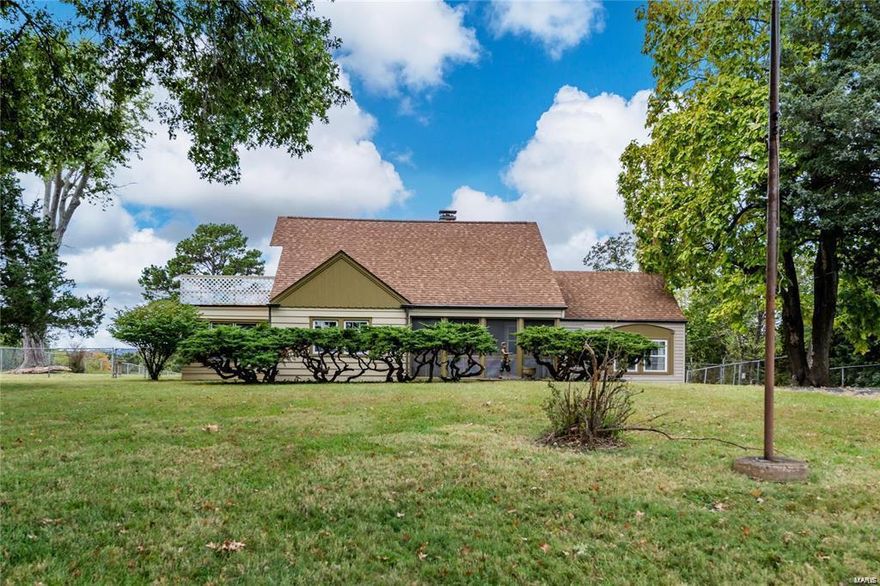 Possibly the most gorgeous level fenced in yard in all of Arnold . What an adorable home to top it off!! This very large cottage feel home is set perfectly on the one acre lot. 3 bedrooms 2 full bathrooms, 2 halfs bathrooms and lots of areas for a family to spread out and also quaint spaces to enjoy together such as the sunroom or the screened in front porch.  A house of this size for this price in this location....unheard of!