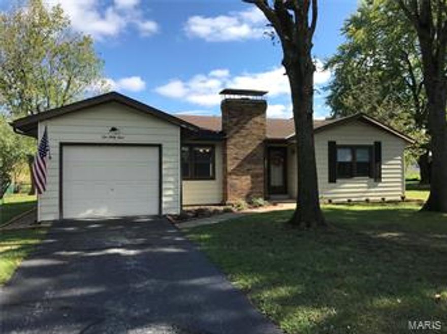 Just what you've been waiting for, now jump fast.  This home has been renovated from head to toe. 1362 Square feet, with large dining kitchen area and woodburning fireplace in Living Room.  New flooring, New light fixtures, new window coverings, new countertop, new sink, new disposal, new deck, new garage door opener, new furnace, new sump pump.  Tile floor in bathroom and laundry room.  120 x 90 yard gives you room for animals to run around in the fenced in yard.  They really did this one up right for you.  Call for an appointment.