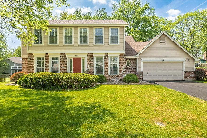 You don't want to miss this beautiful home! Through the front door, you will find the spacious sitting room, flooding with natural light and gorgeous wood floors. Make your way into the separate dining room, perfect for entertaining. The updated white kitchen features custom cabinets, a breakfast bar, large pantry, granite counters, & stainless steel appliances. Breakfast room leads into the living room with a gas log fireplace. Main floor laundry & half bath complete the space. Head upstairs to the spacious master suite with a walk in closet, dual vanities, & a whirlpool tub. Three additional sizable bedrooms & an updated full bath complete the second floor. Don't miss the finished basement complete with a family room, bonus room, full bath & cedar closet! Endless possibilities in this versatile space! Outside you'll find a large fenced-in yard & patio. 2 car attached garage. Conveniently located by parks, shops, and restaurants. Take a tour today, you don't want to miss this one!