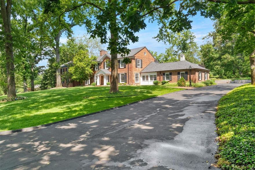 Welcome to the magnificence that is 7 Greenbriar Drive. Having been cherished by generations of the same family since its construction, this stately home is looking for a new family to love it into the future. With abundant space, this residence offers endless possibilities for creating your ideal living environment (it even has a dog washing station in the lower level for your four-legged family members). Featuring a first floor in-law addition to the main house as well as a fully- equipped guest apartment above the garage, the home could work for multi-generational living or accommodating guests with the utmost privacy.  Indulge in the luxury of your own private oasis with the sparkling pool and spacious patio, perfect for hosting lavish parties or simply basking in the sun. Immerse yourself in the serenity of the gardens, providing a picturesque background for outdoor activities or simply relaxing. Don't miss your opportunity to be part of the legacy that this home represents. Additional Rooms: Sun Room