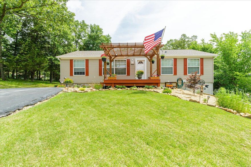 You are going to love this home-lake living at a great price! The gorgeous lake is only 1/4 mile away. Well maintained 1296 SF manufactured ranch home w/over 640 SF of basement storage-accessable from outside. Great curb appeal-newly landscaped! Fantastic lot w/a private backyard backs to woods, plus, 2 new decks w/pergola. 3 beds & 2 full baths! The spacious master offers a walk-in closet, huge master bath w/soaking tub, separate shower & new flooring. Kitchen has w/all the appliances, new ceiling fan & new faucet! There is a main floor laundry room-new washer & dryer stay! Plus, some new painting throughout! Driveway is asphalt & flat. Brand new encapsulated walk-in-crawlspace, dehumidifier stays, plus new down spouts. Private subdivision w/28 acre spring fed lake, boat ramp & swimming area maintained by subdivision. All sewer & road maintenance is included with the yearly association fee. This one won't last long! Only cash, conventional or VA pre-approved buyers please.