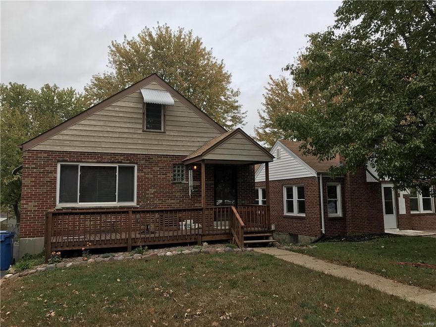 BACK ON MARKET THRU NO FAULT OF THE SELLER! Cute Brick home with some updates.  Beautiful wood floors, curved ceilings, newer windows, upstairs attic area could be easily finished to make an extra bedroom,  Finished lower level with family room area and extra sleeping room and a full bath. Walk out basement.   Deck is covered to enjoy the summer breeze.