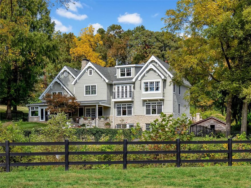 Welcome home to this secluded & private country estate with idyllic views of specimen trees, riding ring & woodlands beyond. Enter from the porte cochere thru the charming side Dutch door or the main door opening to the heart of the home. The 1926 original home features a generous sized living room w/ fireplace (currently used as a dining room), adjacent sunroom and family room anchored by a handsome stone fireplace & built-ins which opens to the beautifully designed kitchen. The office w/ custom cabinetry & an ensuite guest room complete the 1st floor. 2nd floor features an oversized, airy master suite with cozy sitting room & balcony. 3 additional bedrooms, 2 baths, & laundry. The sunny 3rd floor doubles as a play room & workout area. Lower level has a comfy hangout space with wet bar & entertainment in mind. You'll also find 2 bedrooms, 2 full baths & laundry room with a dog washing station. A one of a kind setting and wonderful lifestyle for your family in the heart of Huntleigh. Additional Rooms: Sun Room