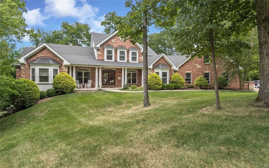 Est. 2003: Custom Home on 3 acres in Wildwood. Step inside to discover a grand 2-story entry foyer w/ marble flooring set between front office & spacious dining room with coffered ceiling. inviting living room features a double sided gas fireplaces & wall of windows / french doors w/ gorgeous view of the private rear yard. Spacious kitchen is a chef’s dream w/ custom cabinetry, granite counters, built-in stainless appliances, double convection ovens, walk-in pantry, & butler pantry, & fireplace. Adjoining breakfast room leads to maintenance free deck and sizable mud room provides access to 3-car oversized garage. Main floor master suite boasts sitting room, fireplace, walk out to private deck, double walk-in closets, & exquisite bath. Upper level offers 3 bedrooms over main house, large 4th bedroom over garage & 2 full baths while lower level boasts rooms for recreation, family, home theater, & wine cellar and leads out to flagstone patio w/ firepit overlooking sizable landscaped yard. Additional Rooms: Mud Room