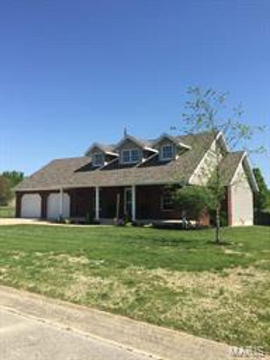 This beautiful 1860 sq ft. ranch style home sits on the edge of town in Bradford Estates. It offers an open 3 bedrooms 2 baths split floor plan. It has a 2 car garage and sits on on 1.1 Acres m/l including Extra Lot. 
When you walk in you will love the 20 ft. ceilings in the entryway. The living room is welcoming with its 12 ft. vaulted ceiling, built in entertainment center, wood french doors and custom wood blinds. The home features carpet, tile and hardwood floors throughout. The spacious master suite has its own access that leads onto the huge deck. You'll fall in love with the gorgeous 2-Tier Deck w/Gazebo in the back of the home. It is beautifully accented with black rod iron fence.