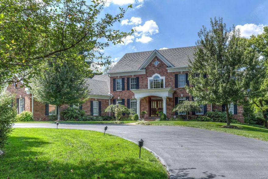 Exceptional 1.5 Sty w/ 3 levels of living space. 6 Beds, 5 full bths, 2 half bths!  Gleaming wd flrs on mn flr.! 2 Sty entry foyer, Paneled Study w/ beamed ceiling, built in desk & bookcases. Expansive dr for your entertaining delight.  Large Grt Rm w/ tray ceiling, canned lights, gas log frplce w/ marble surround & back bar w/ ice maker & refrig.  Gourmet Delight of kit w/ 2 islands, tons of custom cabinetry, granite counter tops & backsplash, downdraft gas cook top, two built in refrig, dble ovens, warming drawer & more.  Wonderful planning desk in kit.  Beautiful Morning Room/Hearth room w/ views of wonderful patios and back yard from windows on 3 sides. A lndry rm to die for w/ built-in cabs, laundry sink, built in closets & 1/2 bath!  Master Suite features bay window, ceiling fan, tray ceiling, canned lights, his & her closets organized, MBR bath w/ whirlpool tub, sep shower, commode area, his & her sinks. 2nd flr w/ 4 beds, each w/ ceiling fans, walk in closets. 3 full bths!