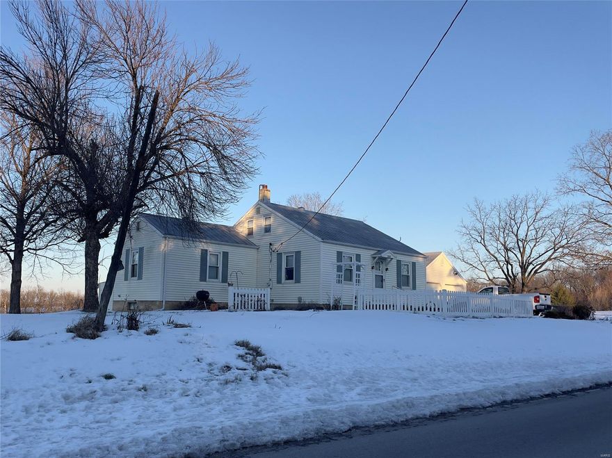 Expansive 9 acre lot just outside of city limits lends itself to a variety of future plans. Current home boasts 1510 square feet with 3 bedrooms, and 1 full bathroom. There is a nice breeze-way between the 2-car attached garage and home. There are 2 beds on the main floor and one upstairs. There is a nice family room area and another room great for a formal living room, den, TV room or home office. Sitting high up off Bieker Rd, you will enjoy an expansive view of the City of Washington. Breath taking all year round. Close to shopping, restaurants, and entertainment.