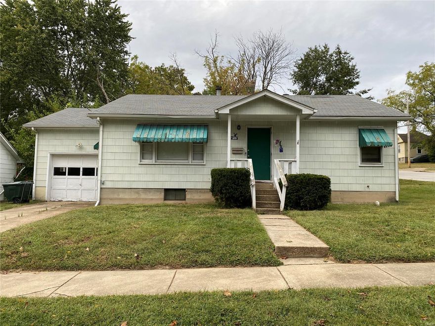 Adorable home in the downtown Rolla area! This home offers 3 bedrooms, and 1 bathroom! There is a full walk-up basement, as well as an attached garage that allows access to the kitchen! The laundry room has newer washer and dryer available, and the kitchen offers newer appliances as well! This home comes with an owned security system! The basement has a full bathroom, and tons of extra room for storage, and living space!