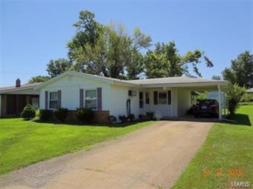MUST SEE, MOVE-IN READY! Home has Updated Flooring, Counter Tops, Bathroom, Windows and Water Heater. Conveniently located in town. Well maintained yard with two storage sheds and 10 X 31 Covered Porch to spend your evenings and have family gatherings. Call to make an appointment today!