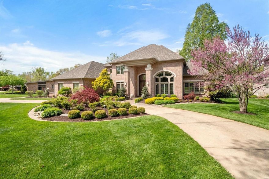 Pristine custom home in Ladue Schools offers nuance and luxury throughout.  Be taken by the immense ceiling height, wrought iron railings, dramatic windows, and sleek hardwood floors in the formal areas. The Chef's kitchen has commercial-grade appliances, a massive island, and exquisite custom cabinetry.  Adjacently, the hearth has vaulted ceilings and a fireplace flanked by built-ins.  Easily transition outdoors to the plus-sized pergola and lush private landscape perfect for a pool.  The main level bedroom is an exquisite retreat, with a sumptuous spa-like bath, dominating private study, and separate stairwell to the gym below.  Upstairs has generous accommodations for guests.  The lower level has high ceilings, a full bar, and plenty of configurative options for storage space. Oversized 3 car garage, back turn around pad, and circle drive allow for plenty of guest parking. Set back on a level lot, it's the perfect welcoming at the end of the day. Additional Rooms: Mud Room