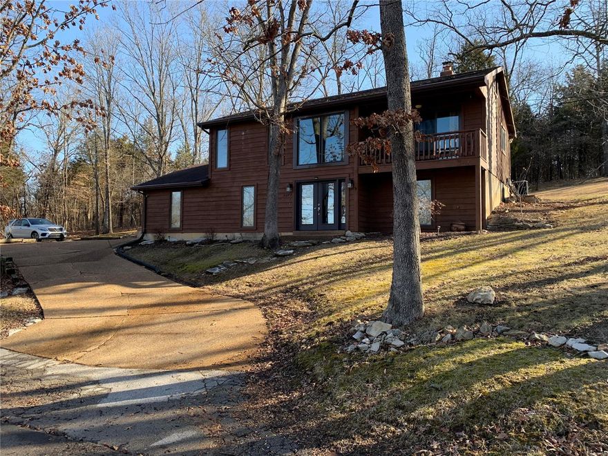 Welcome to 2277 Fawn Drive! This unique 3 bedroom, 2.5 bath home, located in Forest View Hills, offers seclusion yet conveniently located . The spectacular two-story foyer with double doors, large windows, plant shelf, and a contemporary staircase will welcome everyone entering your home. The open floor plan includes the Kitchen, Dining area, Family/Living room and Half Bath.  Sliding doors to the wooded back yard and patio. Additionally there is a covered deck off the Dining area that overlooks a spectacular view - perfect for morning coffee or tea, or on a rainy day. The Master Bedroom Suite includes a walk-in closet, laundry room with W&D, and full bath. At entry level there are two additional bedrooms. The 2-car garage has plenty of lighting - could be a perfect workshop if needed. Outdoor shed. Owner By Contract Seller selling as-is. No known defects. Roof 5+/- years. Average monthly electric over last 12 months $120. All furniture, tools, and appliances included in sale as-is.