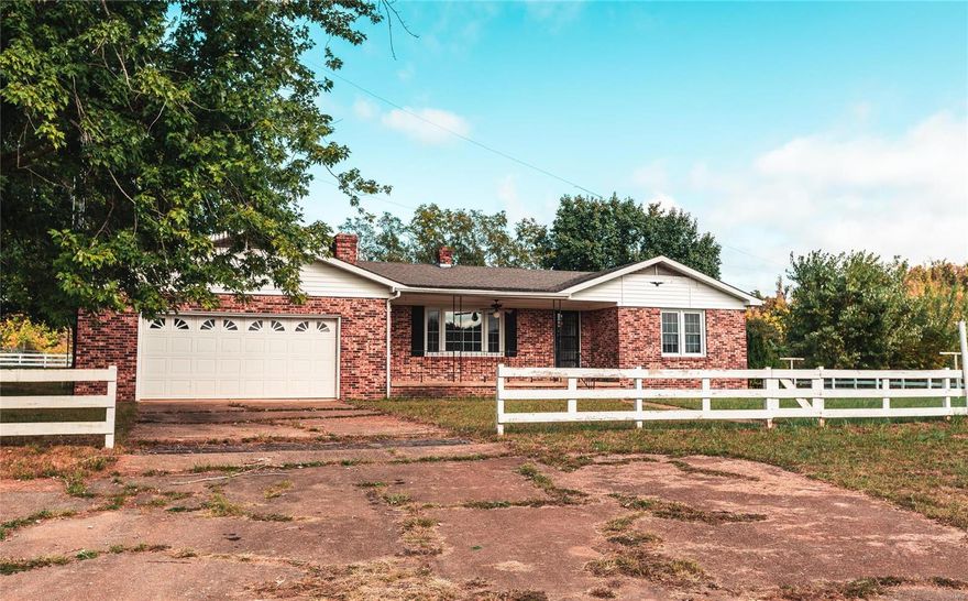 Beautiful Missouri 987 +/- Acres in Iron County, 3 bed 2 bath home surrounded by the pastures giving you an incredible view. Trails all over the property give you access to almost every inch of this property. 5ac Fully stocked spring fed lake is set back behind the house for privacy to enjoy. Plenty of room for every type of recreational person, with all the miles of trails on the property for hiking, riding atv & utv's, horses. If you like to hunt, you could set it up to let the Deer & Turkey to have a sancuary that you never have to disturb them and plenty of areas for food plots to set your hunting up right. A live train track spits the proerty with a crossing across the tracks or a tunnel that takes you under the tracks that you can drive a full size truck through. Ruble Mountain sits center of the property elevation of 1004 ft. Home, Woods, Trails, Pastures, and a Lake what more could you be looking for 2 hours from St. Louis.