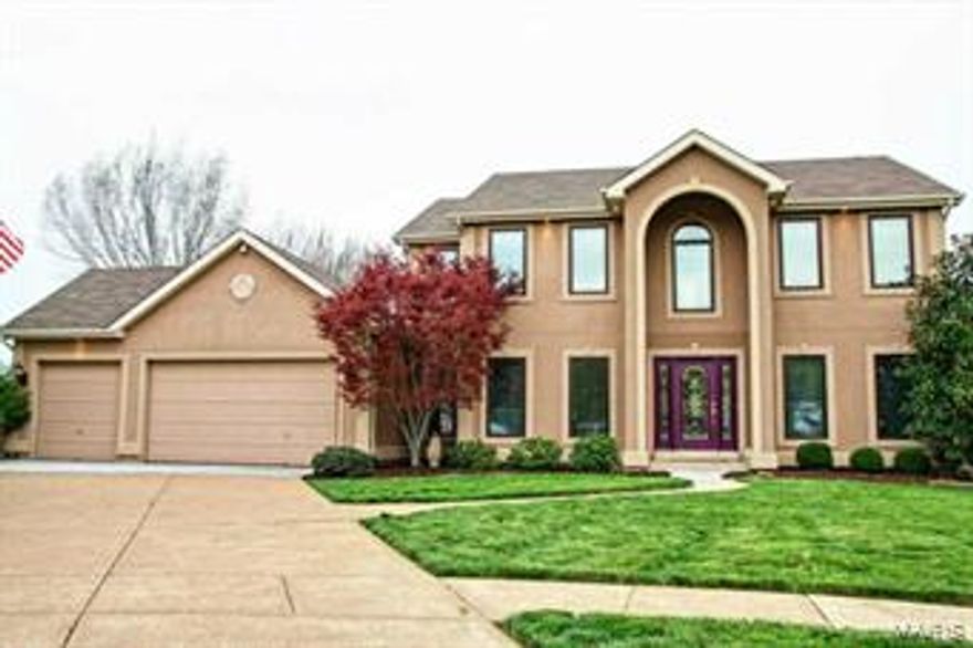 This gorgeous 2 story atrium home offers 4 bedrooms, 3.5 baths & is nestled on a cul-de-sac. The updates are countless including 5” hand scraped hardwood, Pella Windows, high end appliances & more! The 2 story foyer leads to the spacious dining room with crown molding & separate living room. Open floor plan boast exquisite hardwood flooring throughout & custom details. Enjoy the backdrop of windows from the  great room looking out to a private setting. This opens to a gourmet kitchen & chef’s dream with Subzero refrigerator, Wolf dual fuel range, wolf microwave drawer & warming drawer, handcrafted granite island, custom cabinetry, decorative backsplash & more! The master suite features vaulted ceilings, hardwood & luxurious master bath. The finished walkout lower level is complete with gourmet kitchen, stunning slate flooring, full bath, surround sound system in TV room, rec rm, possible 5th bedroom & more! Main floor laundry, attached 3 car garage, HUGE deck & patio with private yard!