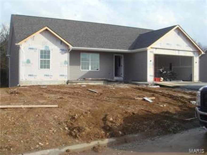NEW CONSTRUCTION !!! (Some of the photo's displayed are from a prior sale.) Beautiful NEW total electric home located on a nice lot that backs to trees, in East Central Franklin County. 2-car garage with 8' door, 10' X 10' deck, full walk out basement includes a service door, windows and rough-in plumbing for future expansion. 2 full baths on the main floor, main floor laundry room, ceiling fans, disposal, smooth top range, built-in microwave, recessed lighting in the kitchen and living room, tilt thermo insulated windows and many other upgrades including beautiful wood floors. Immediate possession at closing is available. The photo's are of a previously built/sold home and will be updated when photo's are available. Estimated time to completion is projected to be 30 days.