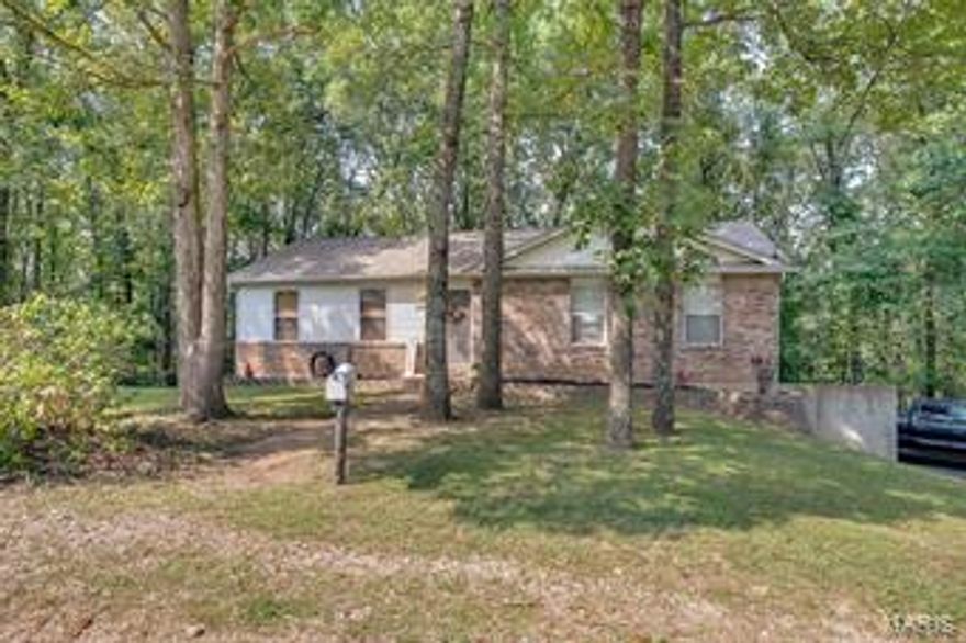 Perfect country living close to everything 3br/2ba Ranch on 3.5 wooded acres. Cathedral ceiling in the Family Room and Dining Room, some wood floors through-out. Open and bright kitchen, all appliances to stay. All electric home, septic and well, with full basement, rough in bath and walk-out. Garage is oversized and tucked under in basement. Brick veneer exterior with vinyl siding. Large deck overlooking the park like yard.  Call today for your personal showing.