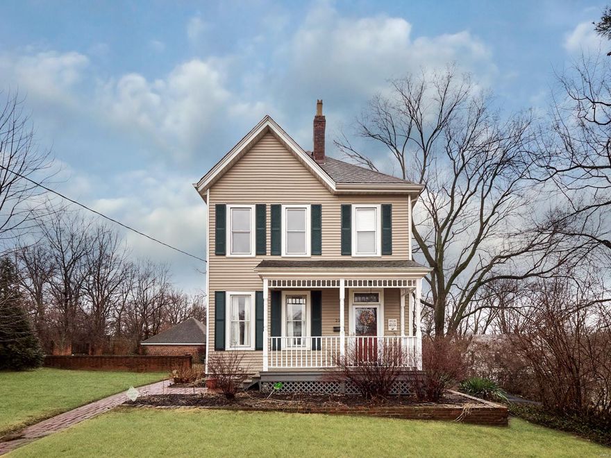 Victorian beauty at a very affordable price! This Century home is spacious inside with tall ceilings & windows that allow lots of natural light inside. The home is on 3/4 acre and has an amazing, level yard with 2-car oversized garage. The main level boasts large kitchen w/ Thermador gas oven. Expansive dining/living room combo has so many possibilities. Half bath, mud room, and beautiful foyer with antique mirror and hand-carved stair handrail and posts complete the first floor.  Upstairs you will find updated bath, 3 bedrooms and additional room that coulrd be used as office or 4th bedroom. Attic could be refinished for additional living space. You will enjoy many evenings on the screened-in porch which overlooks picturesque yard & courtyard areas. Entire home is freshly painted with newer carpet and newer siding, gutters, and downspouts. Home has updated electrical and plumbing. Less than 2 miles from 270 and 170 & close to many large employers like Boeing, Express Scripts and UMSL.