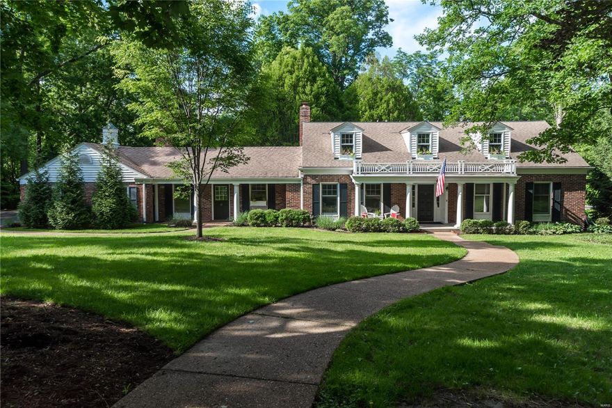 This charming home on nearly three wooded acres offers a unique opportunity to live in one of the most sought-after neighborhoods in the heart of Ladue.
Amenities include a main floor master suite -  Open kitchen/hearth room and breakfast nook.
Lush views of the yard, in-ground salt water pool and brick patio as seen from the wall of windows in living room.
Three additional bedrooms and two baths on the second floor; one currently used as a den, each with lots of closet space, and neutral carpet.
Finished lower level has large family room, office and full bath, with walk-out to the pool. 
Wood floors, pocket doors, replacement windows, custom moulding, organized closets and zoned systems are some features.
Comfortable yet elegant - in the finest location.
