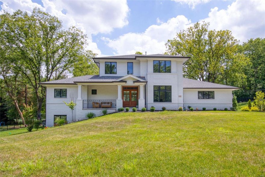 Contemporary meets classic American Craftsman. It all starts with a covered front porch w/gorgeous wood entry doors. This home features airy 10’ ceilings, 8” trim, upgraded Anderson windows, custom wood flooring. The gourmet kitchen features a huge island w/quartz counter, 60” cabinetry, custom tile backsplash, upgraded Kitchen Aid appliances. Great room & hearth room features stacked stone gas fireplaces. Butler & walk in pantry, mudroom and MFL keeps everything neat & organized. Master bedroom sanctuary provides a sitting room & dressing area, luxury bath w/custom tiled shower and air-jet tub. The upper level features reading nook, 2 bedrooms w/shared bath, 1 bedroom w/private bath, custom blinds and 2nd laundry area. LL provides recreational space, 5th bedroom and full bath. Additional features: level yard, 3 car garage, central vac, sprinkler, low maintenance deck, box beamed ceiling, transom windows & contemporary lighting. This 2 yr home was meticulously crafted. Ladue schools. Additional Rooms: Mud Room COOL: 14 SEER+