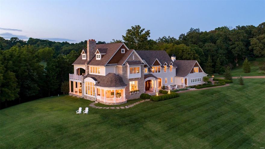 Just off Wild Horse Creek Road, you’ll swear you are in Napa on your private estate. The 'Hebron Home' is a stunning gift of craftsmanship and passion that sits high on a hill, with views of Missouri bluffs and Babler Park. The home boasts six bedrooms with the potential for two master suites; one with a covered deck and outdoor fireplace. Every one of the five full baths and two half baths are unique. Copper and porcelain sinks help make each space memorable. The home has three indoor and two outdoor fireplaces. Hand scraped wide plank walnut floors grace the entry foyer and main hallways, while white oak floors shine in the main kitchen and first floor living spaces. The home has two full kitchens and features a native stone tunnel adjoining living quarters and housing a wine closet. Incomparable attention to detail touches every single part of the home with purpose and pleasure. Convenient to Chesterfield Valley, the Wildwood Town Center, and Spirit of St. Louis Airport.