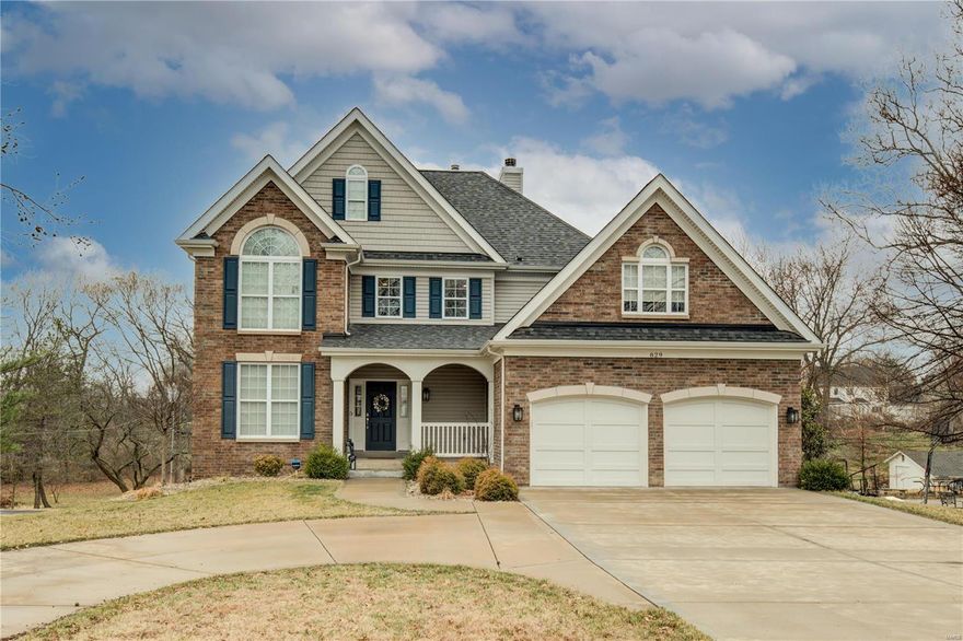 Three year new, 1.5-story in Creve Coeur in Ladue Schools!  Features 5BDS, 4.5 baths, and 4,000SF of living space including a finished walkout LL on a spectacular .78-acre lot. Loaded with upgrades & in move-in condition! Enjoy the open floor plan with granite center island kitchen w/breakfast bar & breakfast area with GE gas cooktop & stainless appliances. There are 2 primary suites on both the 1st and 2nd level s and each suite features a separate tub & shower w/glass sliders. Notice the wood floors, custom built-in breakfast area, main level laundry w/sink & both hanging & built-in storage, zoned HVAC, circle driveway, sprinkler system, security system, wood deck, and patio. The second floor has 3 additional bedrooms and 2 baths. The wonderful light-filled lower level includes a 21'x17' rec room, 5th bedroom, & 17'x'13' media/theater room with projector and speakers. The backyard is a wooded playground. The tree-lined neighborhood has other new homes & is convenient to everything!