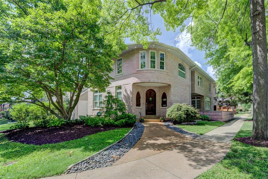 Location, location. Custom built in 2003, this gorgeous brick home in Clayton Gardens offers style and convenience. Fantastic home built in a prestigious neighborhood with high ceilings and bright inviting rooms. The Living Room features a stone gas fireplace, hardwood floors and 15-foot ceilings with floor to ceiling windows. A formal dining room leads to a chef's kitchen and family room. The kitchen boasts custom cabinetry, pantry, gas appliances, double ovens, and center island. First floor laundry and attached 2 car garage with EV plug. Ascend from the first floor on the elegant staircase, to the 2nd floor with 4 spacious bedrooms and a designated office. The wide "hallway nook" is charming. Primary bedroom features a gorgeous ensuite of closets, jet tub and dual vanities. The finished lower level includes an egress window for a future bedroom and plumbing for a bathroom. Enjoy walking in this tree lined neighborhood with Clayton parks, libraries, schools, retail, and restaurants. Some Accessible Features