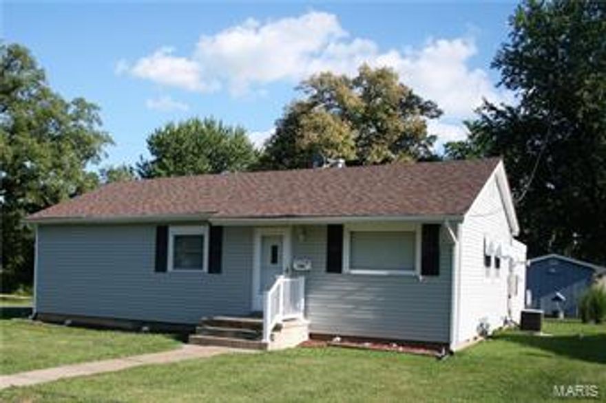 MOVE IN READY!!   STARTER ...RETIREMENT.... or RENTAL.  This house is a GREAT investment no matter how you look at it.  Located on a Corner lot in a Quiet neighborhood just waiting for someone to call it home.  This home offers two bathrooms and 2 Bedrooms, with a BONUS room, that could easily be a 3 Bedroom. Complete RV hook up in the back yard for your camper or visiting family/friends.  Spacious storage shed. New roof and new laminate flooring. This house won't last long, CALL TODAY for your SHOWING.