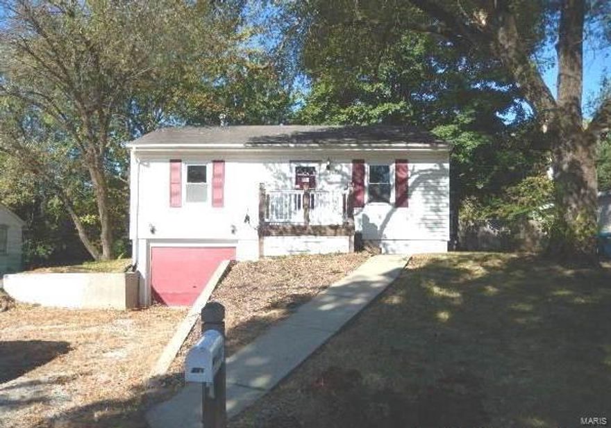 This is such a cute dollhouse of a home. Vinyl sided, 6 panel doors, 1 car tuck garage, white cabinets, gas range and a partially finished basement. Cozy as can be and such a convenient location with quick access to Hwy 94 or I-70.  This is a Fannie Mae Homepath property. SpecialListingConditions: Foreclosure