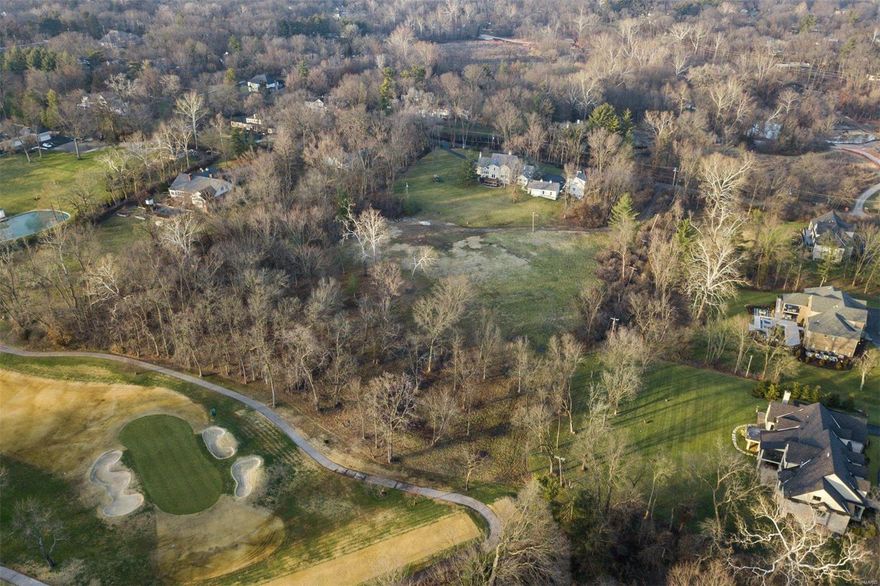 Two Lots (9710 & 9714 Litzinger) Totaling 4.74 Acres in the Heart of Ladue backs to Old Warson Country Club.   The Tax ID (20L-12-0309)associated with this MLS listing represents one of the two lot parcel that are to be sold as one.  The price, lot size and taxes paid are for both lots combined.