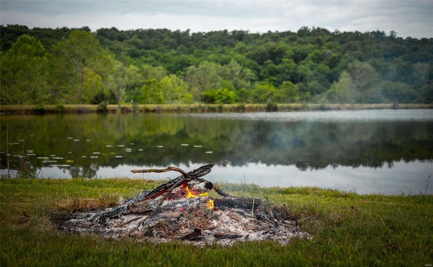 THIS PIECE OF PARADISE IS NESTLED ON THE SE BORDER OF SULLIVAN, MO IN CRAWFORD COUNTY.  263.64 Acres +/- that has approx. 90 acres cleared and 173 acres wooded.  Country songs are written about land like this with a beautiful stocked 3 acre lake filled with largemouth bass, crappie, catfish and Bluegill.  There is also a stocked pond with Bluegill, crappie and minnows. The property adjoins Stater Creek and includes a covered pavilion to fish off of or enjoy family BBQ's or fish fry's. This property is just a few acres away from MO Conservation Land and surrounded by wildlife galore, excellent for hunting or trapping-trophy deer, turkey, rabbits and squirrels. Permanent recreation on site and the Meramec River is only 7 miles away. This paradise would make for a beautiful home-site with country living just a couple miles from town and nearby shopping. Land like this is what our parents and grandparents were raised on, let this be a prized memory for generations to come.