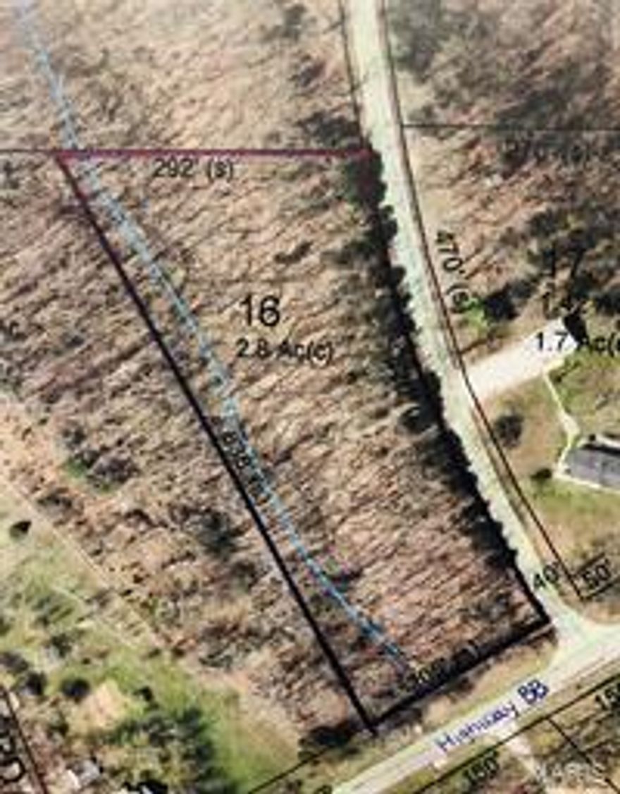 2.8 +/- acres of unrestricted land! It is mainly wooded and offers plenty of privacy. Conveniently located just minutes from Highway 50 or Highway A. Approximately 470 feet of road frontage on Whiskey Creek Rd and approximately 205 feet of road frontage on Highway BB. Can be connected to Krakow Water District 1. Here is your opportunity to build your dream home!
