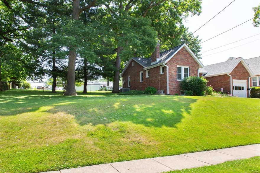 **OPEN 7/16 FROM 1-3 PM.**Brick charmer w/enticing curb appeal. On numerous occasions this home has won the City of Overland Neighborhood Preservation Award. The home sits on a fabulous beautifully landscaped fenced 1/3 acre lot shaded by 100 yr old oak trees. Kids & pets alike will love this yard. As you step inside you will discover beautifully refinished wood flrs appealing wood trim & wood paneled doors. All the dbl pane windows are energy efficient. Most of the walls & ceilings have been freshly painted providing a fresh clean finish. The kitchen is compact & efficient. The hall bath has had some updates. The lower level provides living space that is carpeted, has a unique brick finished wall & insulated windows. The bsmt walks out & up to the rear yard. The bsmt has been waterproofed w/sump pit & pump & the roof is new in '22. The Iveland grade school is just a couple houses away & Dyer is a neat & well maintained street of cute homes w/easy access to to all your essential needs.