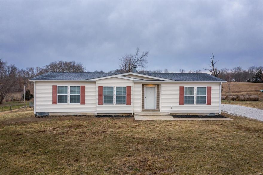 Great location just off highway but still feels like a private country setting. Three bedrooms and two full baths. This manufactured home is on a concrete short wall foundation. Bran new roof was installed in December, fresh paint inside as well. Has is a very smart floorplan. Dining and kitchen area are open, split bedroom and large laundry / mud room. Brand new appliances in the kitchen.  Cash, conventional or VA financing only please. Priced well for the age and condition, don't wait to see this in person! Additional Rooms: Mud Room