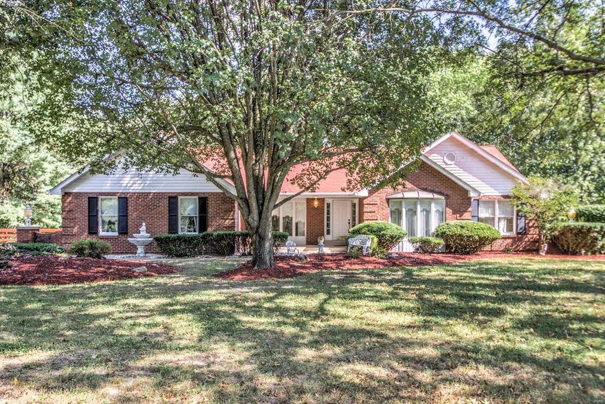 If you are looking for peace and serenity in Florissant, you won’t want to miss this gorgeous 4bd/3.5 bath home. This gorgeous home has been perfectly landscaped & includes a low maintenance brick exterior, huge 3 car garage, patio that overlooks the 3 acres that make up this fantastic property. The main floor welcomes you with a lovely foyer and features a living room, large formal dining room, main floor laundry, 4 seasons porch and a spacious family room that includes vaulted ceiling, ceiling beams, wood burning fireplace and wet bar. An enormous kitchen will make cooking a breeze and features ample countertop space, custom cabinets, large center island and tile floors. It will be easy to stretch out in your large master bedroom that includes ensuite with dual vanity, standup shower and raised oval soaking tub that overlooks the wooded back yard. You will love to entertain in your large walkout finished basement that features nice bar area, additional bedroom and full bath. Additional Rooms: Sun Room