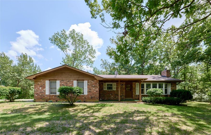 Looking for your own private oasis in Southern Lincoln County?  This all brick home is sitting on 20+/- acres is just waiting for you to come in and make it your own. This property features a 3 acre stocked pond and woods for those hunters & fishers. Sit on your front porch and watch the geese play in the pond, deer prance through the property and the many wildlife that come out to play.  Park your equipment in the 22x38 out building w/ electric already ran for you. Septic 2010, Well 2022, Culligan water system 2022, Roof 2011, HVAC 2019 Property is being Sold "AS IS"