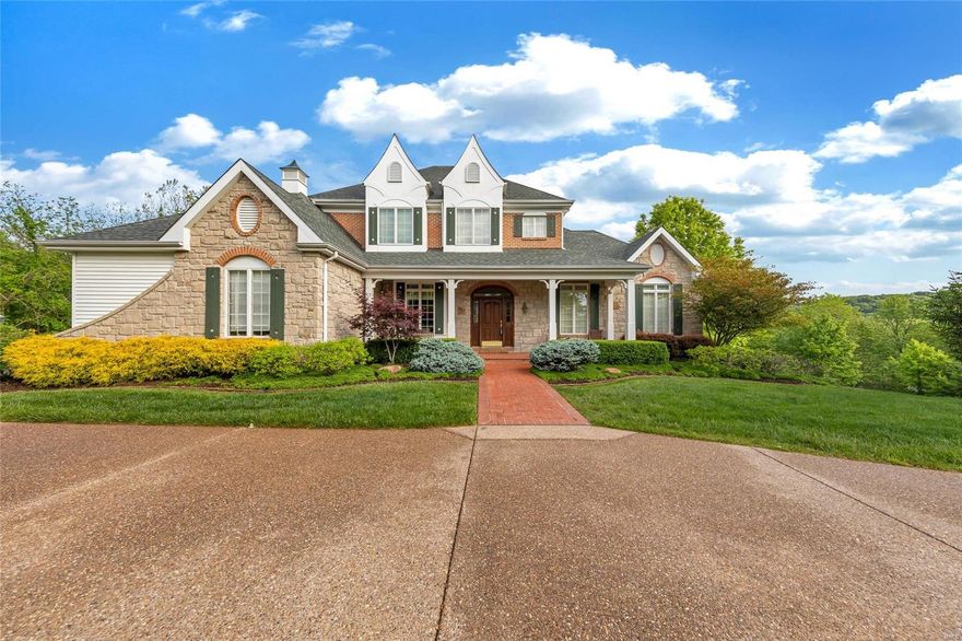 Stately 1.5 story in the boutique neighborhood of Three Sisters Farm offers 4 beds, 4 full/2 half baths and over 5,200 square feet of upscale Wildwood living. Captivating curb appeal welcomes you into the grand foyer with gleaming wood floors throughout. Light filled study leads to the two story great room with fireplace and window wall overlooking the secluded 3.29 acre lot. Past the formal dining is the phenomenal kitchen, including every upgrade: oversized island, custom cabinets, stone counters and commercial appls. that opens to the breakfast room and vaulted hearth room with stone fireplace. Spacious main floor primary suite has luxury ensuite bath and dual walk-in closets. Upstairs you will find three ample bedrooms, two full baths and a bonus loft space. Walkout lower level includes an expansive rec. area, home gym/potential 5th bed and full bath. Enjoy serene views off the deck. Custom MF laundry, circle drive, 3 car garage. Easy access to amenities – Rockwood School Dist.