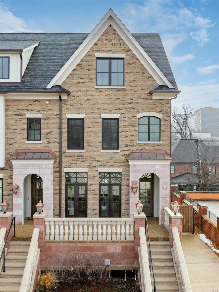 Est. 2023 Prepare to be captivated by the Row House charm of this remarkable Townhome with a private elevator in Old Towne Clayton. Step inside this luxurious end unit & notice the abundance of natural light pouring in from 15 additional south-facing windows and soaring 10-foot ceilings. Three bedrooms and three and a half baths provide ample space for comfort and privacy. Designed for the discerning connoisseur, the kitchen is equipped with top-of-the-line appliances, including full-size Sub Zero Wine fridge & Miele Built-in Coffee System. Every inch of this home is adorned with designer selected, premium finishes. The third flr offers a custom built-in office with walnut desktop and additional flex entertaining space. Take in breathtaking views of downtown Clayton on the large rooftop terrace with outdoor kitchen & fireplace. This residence truly represents the pinnacle of sophisticated living in the heart of it all! Exterior painting and masonry steps and railings to be completed.