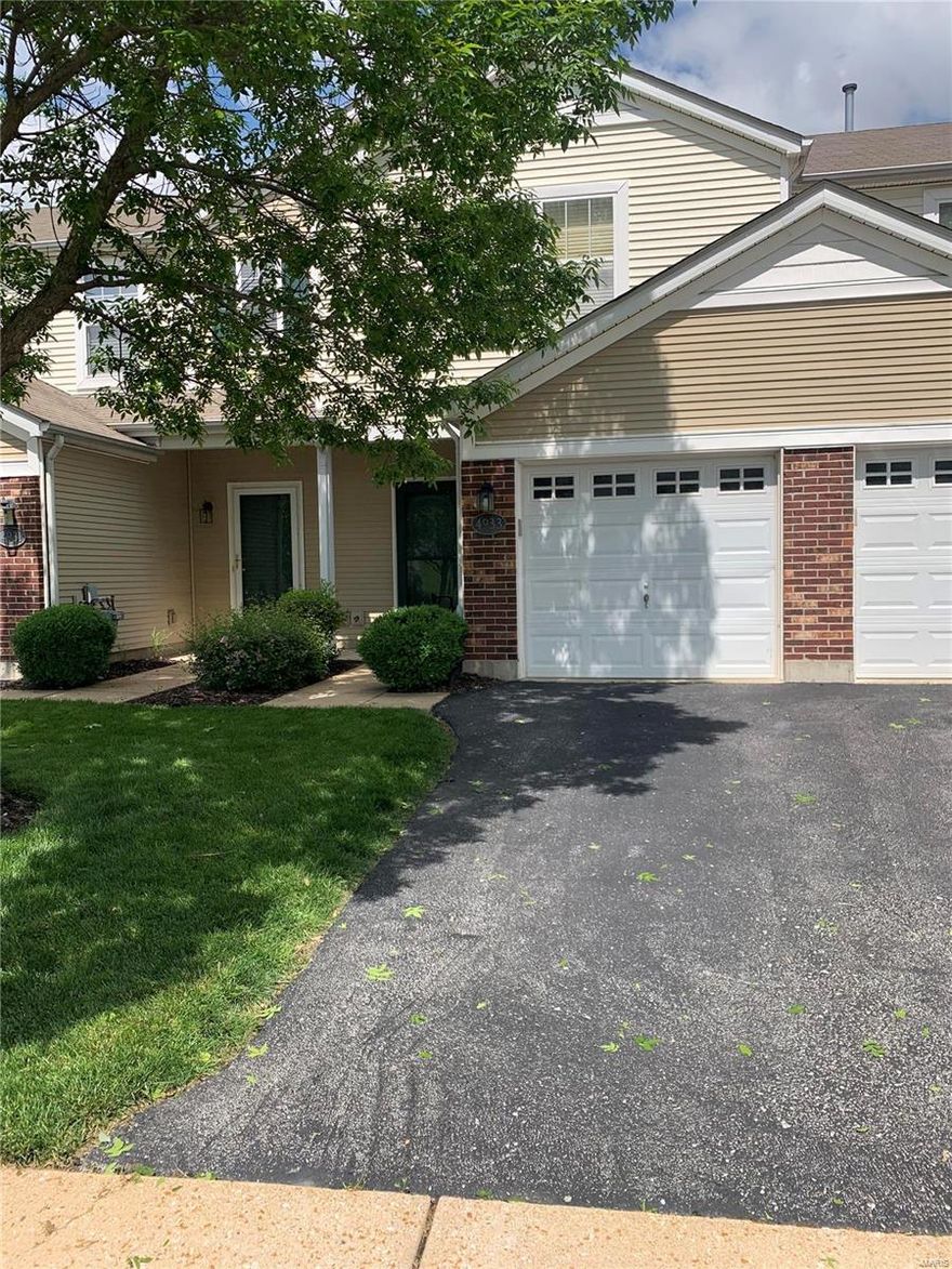 Beautiful 2 bedroom townhouse with 1 car garage.  Spacious open Floor Plan. Eat in Kitchen with upgraded cabinetry and appliances.  Large living room leads out to patio.  Second bedroom  has nice wood floors and beautiful decals on the walls.  One car garage.