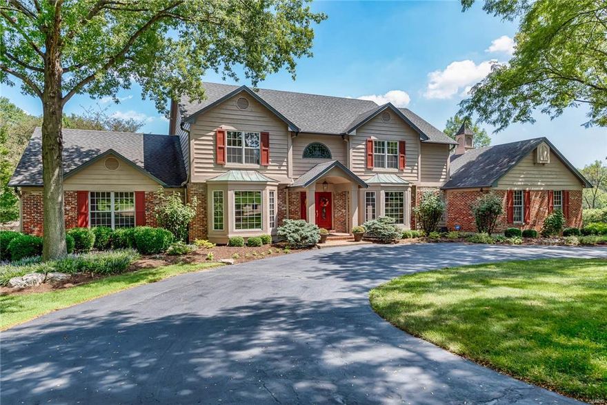 This 5 bedroom home, majestically situated on an acre lot surrounded by beautiful gardens and landscaping includes a saltwater Pebble Tec pool, koi pond and deck. The interior is full of personality brimming with rich appointments and quality upgrades. The heart of the home is the richly appointed gourmet kitchen with top of the line appliances and an expansive center island. The light filled breakfast room enclosed by casement windows provides views of the gracious grounds. The main floor is rounded out by the family room with bar, office with recently added French doors, 2 en-suite bedrooms, plus the laundry room. The attention to detail carries on to the 2nd floor extensive Master bedroom suite together with seating area, workout space, his/her sinks and tremendous walk-in closet. This past year a new AC, furnace and a plumbed gas line to outdoor grill were installed.  Come see this extremely warm and inviting home sitting in a private cul-de sac.