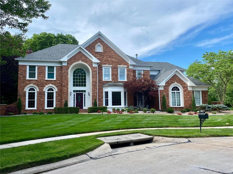Spectacular home on a beautifully landscaped & LEVEL .98 acre lot, located on a private cul-de-sac!  The dramatic 2 story foyer with sweeping staircase is flanked by the living room & dining area & adjoins the huge great room with charming mill work, wood paneling, bar and gas fireplace. The spacious, updated kitchen includes custom cabinets, granite countertops & 2 pantries leading to the light and bright sun room with delightful views of the in-ground pool, fountain and patio. Upstairs provides a huge master bedroom suite with walk-in closet & lovely remodeled bath plus 3 additional bedrooms, 2 baths & bonus room.  Delightful lower level with a one-of-a-kind billiard room (snooker table included!) with stone fireplace & amazing bar area, complete with ice maker, wine/beverage coolers & dishwasher.  A deluxe home theater complete with 100” HD screen, Dolby 7.1 audio, leather power recline seats & popcorn machine.  The unique features and quality are evident both inside and outside!