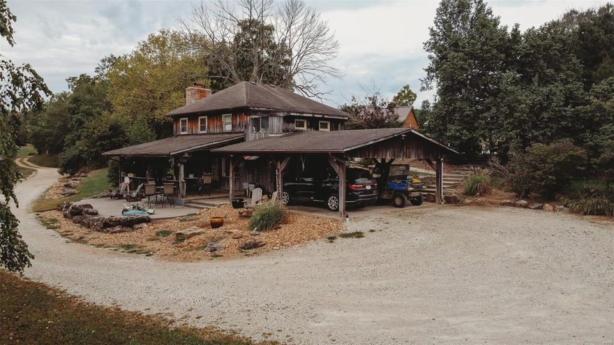 The possibilities are endless with this property.  Home, vacation home, weekend getaway, hunting lodge, or Air BNB!  This 3 bedroom 1.5 bath sits on 181 acres just a shirt distance from town.  There is a full finished walkout basement.  Spacious living/dining room combo.  Kitchen has all stainless steel appliances.  Basement has beautiful slate title floors.  The inground pool and large 24x48 pavilion with electricity and bar is the centerpiece of the property and perfect for entertaining.  The property also offers 4 ponds/lakes.  There is a stocked 4.5 acre lake that is perfect for kayaking, pedal boat, a floating dock would be a great addition and fishing.  There is also 3 ponds (1 spring fed) 2 1/2 acre and 1 1/4 acre.  There are 10 pastures that have been fenced and cross-fenced.  The acreage is 60% of woods and 40% open.  There are lots of outbuildings with so many opportunities.  This property has A LOT to offer and is a must see, so call today to schedule your showing!