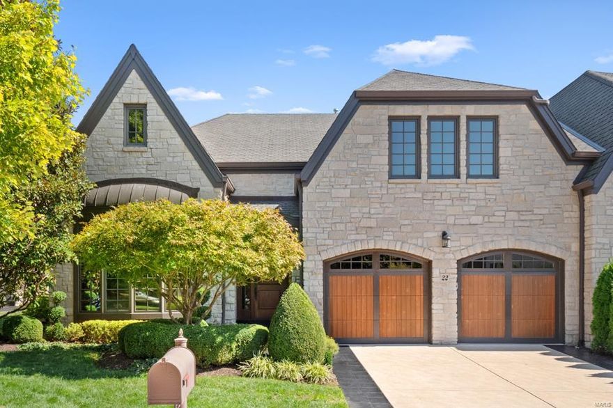 Discover a villa where timeless charm meets contemporary style in a prestigious gated community. Built by Hayden, this home stands out with its classic English stone exterior and refined modern interior. Step inside to find a seamless blend of spacious, light-filled rooms, detailed millwork, and elegant design under soaring 10 and 15-foot ceilings. The gourmet kitchen is a chef’s dream, offering ample storage, a Sub-Zero 100-bottle wine cooler, and sleek honed countertops. Adjacent, a formal dining room awaits memorable gatherings, while the living room, anchored by a stone fireplace, opens to a serene patio. The primary suite is a private retreat featuring a stunning walk-in closet, an office space, & a spa-like bathroom with dual vanities, soaking tub, walk-in shower, and a convenient laundry area. The finished lower level expands the living space with 2 additional bedrooms, full bath & cozy family room with 2nd fireplace, leading to a covered patio. Tons of storage & 2 car garage. Location: End Unit