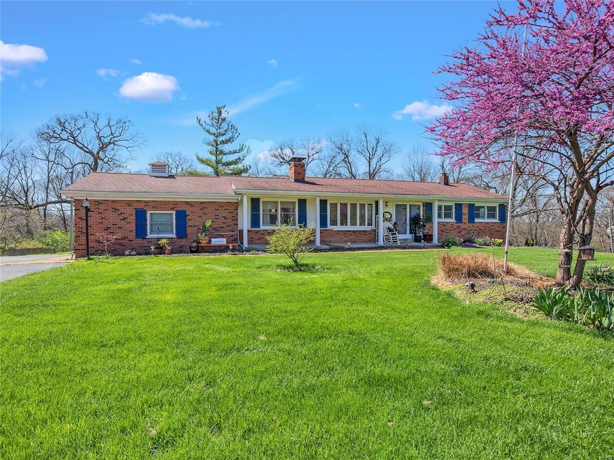This home is the complete package.  Three bedrooms, 3 bathrooms, and an open floor plan all situated on over an acre of usable land.  Freshly painted, newly refinished hardwood floors and new carpet in the living room.  Updated kitchen with newer counter tops, back splash and ceramic tile floor .  Both main floor bathrooms have been updated.  Master bathroom has a walk in shower.  New AC and Furnace 2021.  Partially finished walkout basement with bar, fireplace, half bath, plenty of storage and possible 4th bedroom.  Driveway is long with plenty of room to park additional vehicles, RV or boat.  Back yard features a shed and a small barn.