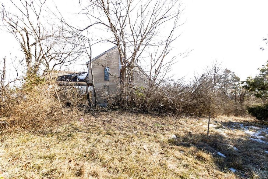 Check out this fixer upper!! Home is need of some repair, would make a great home fixed up, great location. Call today to schedule your showing.