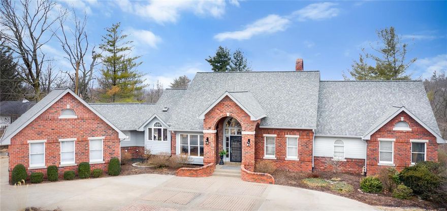 Higginbotham-built ranch home with over 7,000 SF of total living space features dramatic great rm w/ wet bar, soaring fireplace & opens to covered gazebo. Crisp white kitchen is appointed with Thermador appliances & SubZero refrigerator that opens to charming sunroom & breakfast area. Main floor master bedroom retreat features new carpet, fireplace, 2 walk-in closets & dressing area along with access to an indoor hotub & private deck to enjoy morning coffee or take in a sunset. 2 additional bedrooms with private lofts & Jack & Jill bathroom complete the first floor. Lower level features new carpet, 2 beds & 2 full baths one with direct access to pool, wet bar with mini fridge/freezer, ice maker & dishwasher. Wine room & fully equipped exercise room complete the lower level.  Exterior features include private backyard with pool, aggregate patios, new roof & siding, composite decking and 3-car garage. Pool & cool deck resurfaced in 2017. Sit back & relax in this private paradise! Additional Rooms: Sun Room