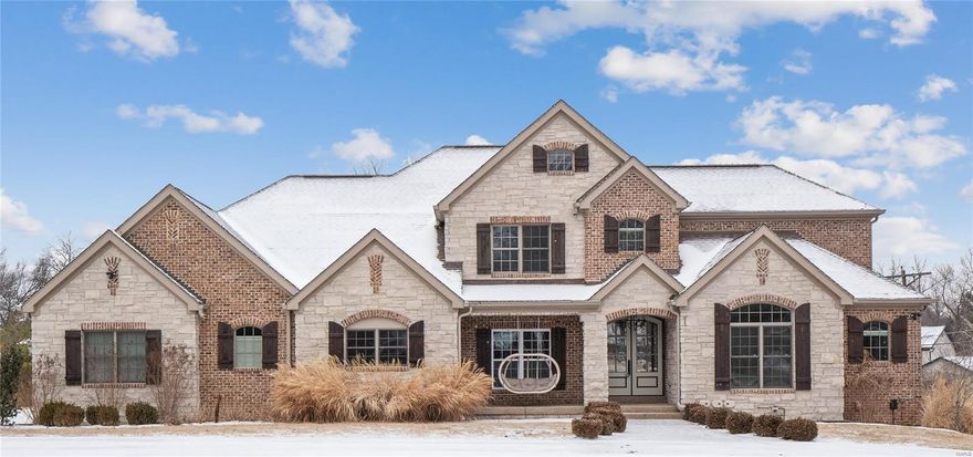 Come see this Frontenac Stunner! With beautiful hand scraped 7" plank dark hardwood floors, unbelievable attention to detail and exceptional mill work and moldings at every turn. The Great Room's coffered ceiling and built in bookcases  flanking the fireplace and substantial Mantle create a fabulously warm and inviting room for entertaining.  The vaulted ceiling in the study/office has a unique, gorgeous plank ceiling. The Chef's kitchen is exceptional with custom cabinets, Solid Surface countertops, oversized island, 48" Viking 8 burner dual fuel range, a 42" Viking refrigerator. Main Floor Primary Suite boasts a spa bath with luxurious soaking tub and an expansive walk in  shower. The upstairs has three bedrooms all with en-suite baths and a 2nd floor family room. The lower level has 2 additional bedrooms, one and a half baths, huge rec space and media room.