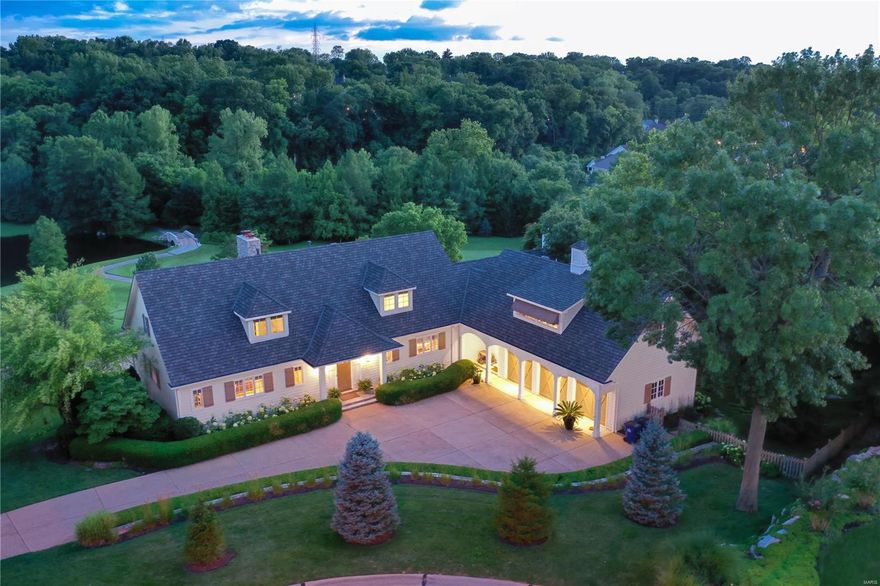 Unparalleled panoramic views offering spectacular sunsets and beautiful vistas, overlooking Greenbriar Country Club's 13th hole. A Dick Busch showcase property, renovated with thoughtful detail. The main level primary suite has a spa-inspired bath and sitting room. Three en-suite bedrooms are found on 2nd level. An expansive lower level is built above grade and walk out; hosting an office (or 5th bedroom), oversize bar, entertaining areas, and billiard and exercise rooms. Find richly appointed details of wide plank distressed barnwood floors, chefs kitchen featuring SubZero & Viking appliances, marble counters, walk-in pantry, open shelving, glass front cabinetry, and vaulted hearth room with stone fireplace. An apartment suite above garage features a private stairwell. A new Grand Manor roof 2021 supersedes existing photos. A separate studio for art, pottery or 2nd office, is separate from the main house. Close access to highways, shops, The Tavern, Rosalitas & DesPeres Lodge.