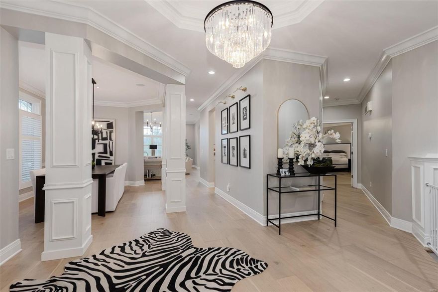 Fantastic Price Adjustment! Do not miss this stunning renovation! This is an incredible opportunity to live in a luxurious gated community in a executive ranch style home with a laid back lifestyle perfect for busy jetsetters!  This home has been beautifully updated featuring new engineered hardwood flooring throughout the main level, high end quartz countertops featuring a waterfall backsplash, new custom built kitchen, newer appliances, new lighting, new custom built in shelves in the main floor office, new millwork to name a few of the upgrades.  This home features over 4200 square feet of living space with two fireplaces, multiple entertaining spaces, a wet bar in the lower level and a main floor laundry. Located on a premium cul-de-sac lot with terrace, covered patio and 2 car garage.  Do not miss an opportunity to see this gorgeous home! Location: End Unit