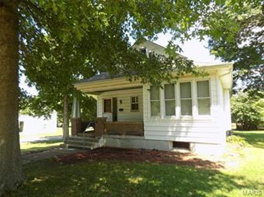 DARLING COTTAGE-STYLE  HOME IN QUIET NEIGHBORHOOD ON CORNER LOT.  2 BEDROOMS, 1 BATH, LG LIV RM, CHARMING FOYER, SUNROOM OFF LIVING RM, KITCHEN W/APPLIANCES, SMALL DINING AREA W/BEAUTIFUL BUILT-IN CHINA CABINET ..ENCLOSED PORCH, SCREENED PORCH...UNFINISHED BASEMENT, NEW CENTRAL HEAT AND AIR, TUCK UNDER GARAGE, CARPORT, CHARMING FRONT PORCH W/GRANITE ACCENT...VINYL SIDING, WELL MAINTAINED..GREAT CORNER LOT ! Additional Rooms: Sun Room